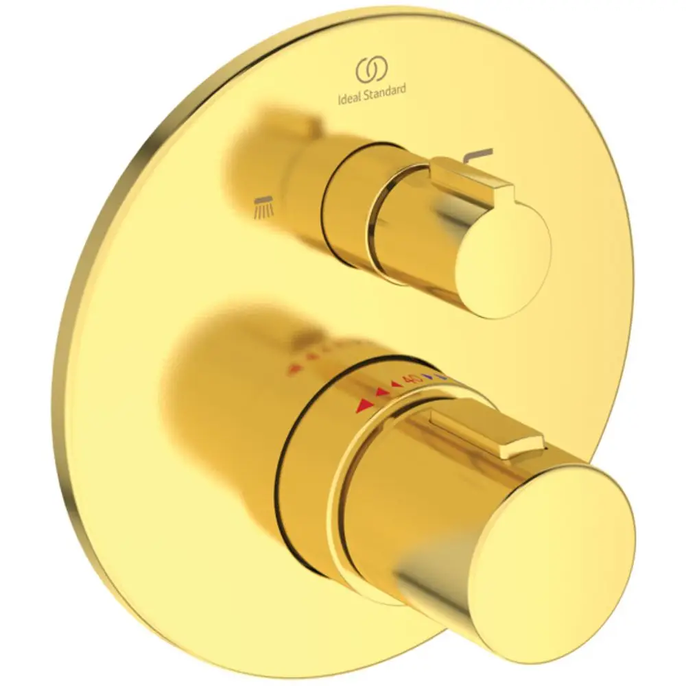 Thermostat von Ideal Standard in glänzendem Goldfinish, mit zwei Einstellungsgriffen für Temperatur und Wassermenge auf runder Wandplatte.